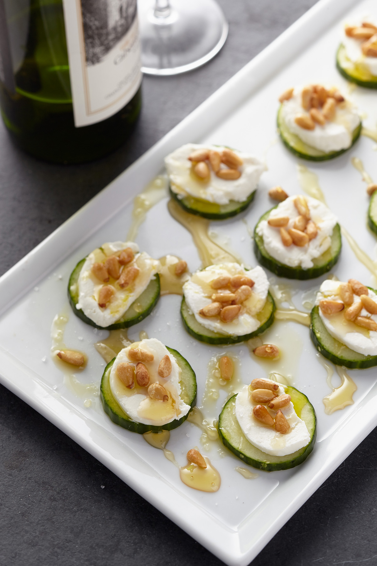 Cucumbers with Goat Cheese, Pine Nuts, and Honey