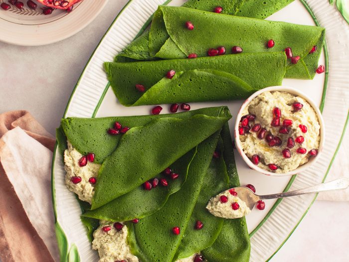 Pesto and Ricotta Filled Spinach Crepes with Pomegranate